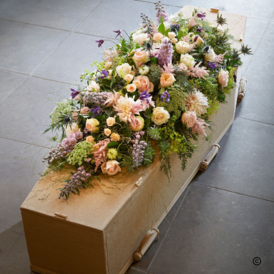 Summer Garden Coffin Spray - This summer garden coffin spray bursts with peach and pink garden roses, along with lilac delphinium.  The lacy texture of dill adds to the overall classic elegance of this beautif
