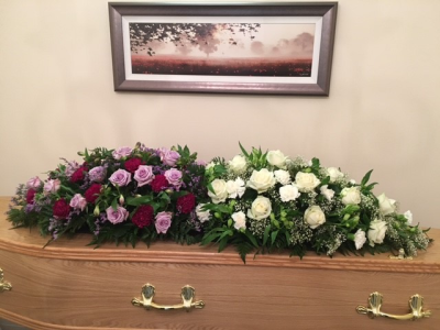 Coffin Spray 2 single ended arrangment put together - This coffin spray is a little different: it is designed as 2 single-ended sprays placed together to resemble a coffin spray, but they can be easily separated after the ceremony.